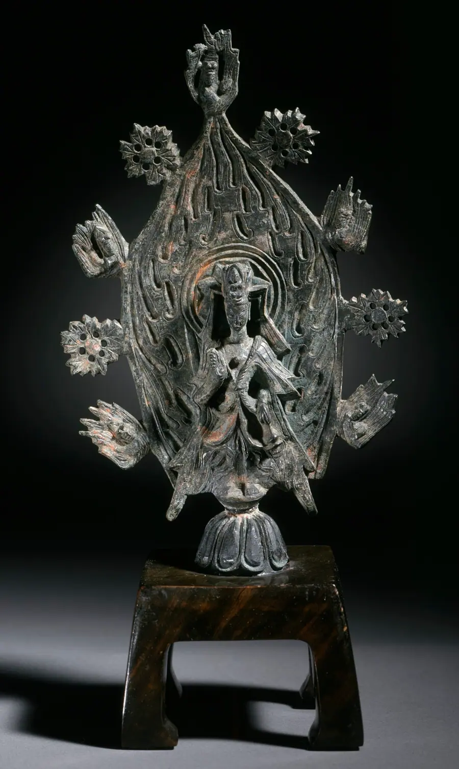 Gilt bronze seated Buddha figure with elaborate crown and jewellery.