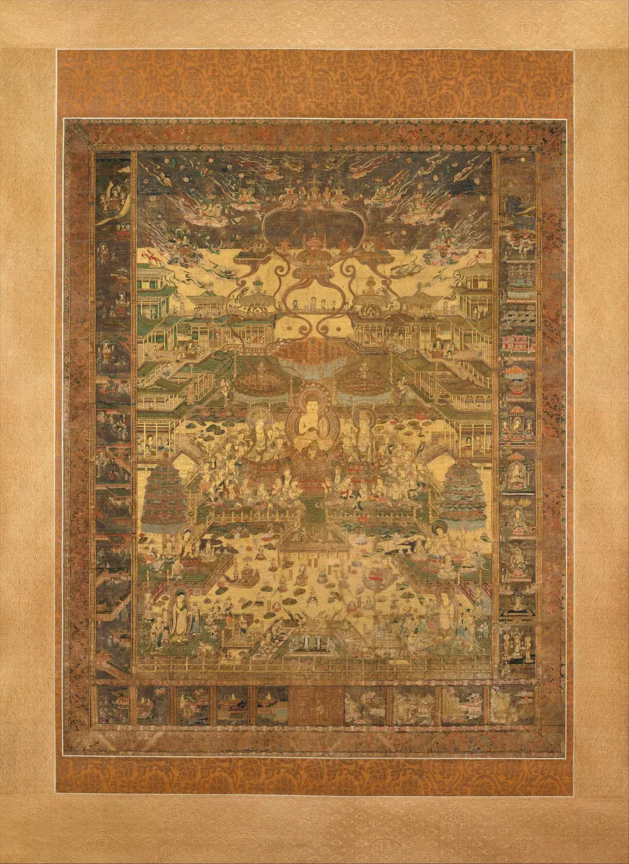 Large symmetrical Japanese devotional painting of a paradise with a central Buddha and terraces of attendants.